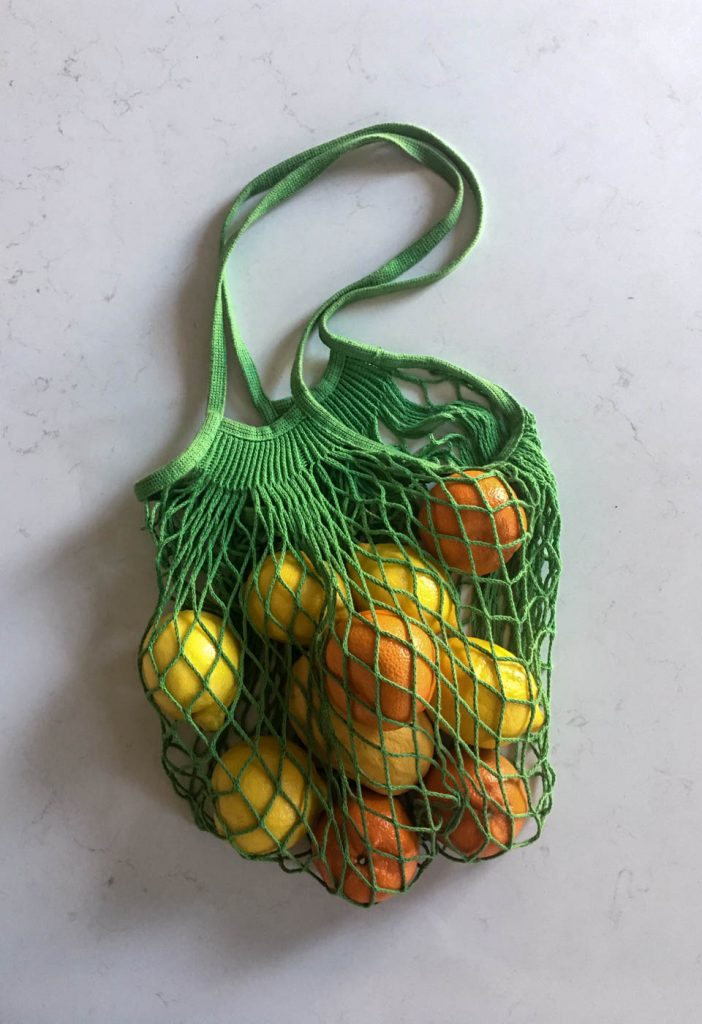 green net bag, citrus