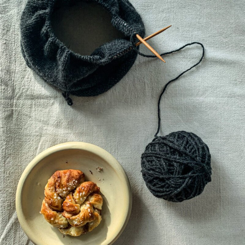 knitting and cinnamon rolls